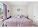 Comfortable bedroom featuring a plush bed, stylish decor, and soft natural light at 2527 Sidewinder Ct, Apex, NC 27523