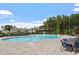 Large community pool with lounge chairs, tables, and a charming covered area at 2527 Sidewinder Ct, Apex, NC 27523