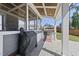 Outdoor kitchen with built-in grill and outdoor dining area, perfect for summer barbecues at 2527 Sidewinder Ct, Apex, NC 27523