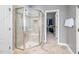 Tiled stand up shower with a glass enclosure at 2728 Cameron Pond Dr, Cary, NC 27519