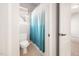 Cozy bathroom with a shower curtain and a toilet at 2728 Cameron Pond Dr, Cary, NC 27519