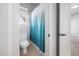 Bathroom with toilet and a tub with a shower curtain at 2728 Cameron Pond Dr, Cary, NC 27519