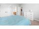 Bright bedroom with two closets and a view into the bathroom at 2728 Cameron Pond Dr, Cary, NC 27519