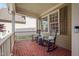 Relaxing front porch featuring rocking chairs and a view of the neighborhood at 2728 Cameron Pond Dr, Cary, NC 27519