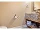 Small bathroom featuring granite countertop and wood cabinet at 307 Durington Pl, Cary, NC 27518