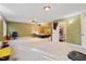 Spacious bonus room with carpet floors, a ceiling fan and neutral wall color, with an adjoining open closet at 307 Durington Pl, Cary, NC 27518