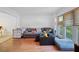 Bright living room with wood floors and a large window offering natural light at 307 Durington Pl, Cary, NC 27518