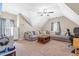 Finished bonus room offers ample seating, soft carpeting, and overhead lighting at 311 Ocean Dr, Clayton, NC 27520