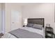 Serene bedroom with neutral tones, comfortable bedding, and modern nightstand at 400 W North St # 1134, Raleigh, NC 27603