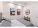 Cozy bedroom featuring stylish decor and comfortable bedding, illuminated by soft natural light at 400 W North St # 1134, Raleigh, NC 27603