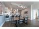 Inviting dining area, complemented by bar seating and a modern kitchen that creates an ideal space for entertaining at 400 W North St # 1134, Raleigh, NC 27603