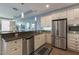 Modern kitchen featuring stainless steel appliances and sleek cabinetry with ample counter space and natural lighting at 400 W North St # 1134, Raleigh, NC 27603