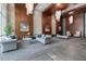 Elegant lobby featuring stylish seating, artwork, and modern lighting fixtures at 400 W North St # 1134, Raleigh, NC 27603