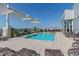 Rooftop swimming pool with lounge chairs and a scenic city view at 400 W North St # 1134, Raleigh, NC 27603