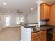 Stylish kitchen with breakfast bar overlooking the living area, perfect for entertaining at 412 Waterford Lake Dr, Cary, NC 27519