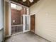 Covered back porch with screen and opened door to home interior at 412 Waterford Lake Dr, Cary, NC 27519