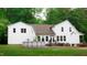 Spacious backyard features a well-maintained lawn, deck, and an above ground pool perfect for outdoor entertaining at 42 Miry Branch Ct, Garner, NC 27529