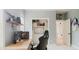 Bright room with desk, gaming equipment, and a glimpse into an adjoining room at 42 Miry Branch Ct, Garner, NC 27529