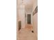 Hallway featuring tile and hardwood flooring, and modern decor at 42 Miry Branch Ct, Garner, NC 27529