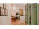 Mudroom with built-in shelving leading to laundry room with new washer and dryer at 42 Miry Branch Ct, Garner, NC 27529