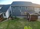 Backyard aerial view with a screened in porch and well-kept lawn at 425 Shadow Falls Dr, Wendell, NC 27591