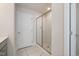 Bathroom features a glass shower with white herringbone tile and a tiled floor at 425 Shadow Falls Dr, Wendell, NC 27591