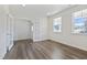 Bright office with a glass french door, wood floors, and two large windows at 425 Shadow Falls Dr, Wendell, NC 27591