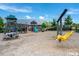 Community playground featuring slides, climbing structures, and a swing set at 425 Shadow Falls Dr, Wendell, NC 27591