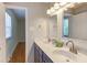 Bathroom with a double sink vanity, modern fixtures, and ample counter space at 4300 Edgehill Ct, Raleigh, NC 27612