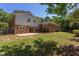 Spacious two-story brick home with a patio and ample backyard space at 4300 Edgehill Ct, Raleigh, NC 27612