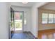 Welcoming foyer with slate flooring, opening into a bright living space with hardwood floors at 4300 Edgehill Ct, Raleigh, NC 27612