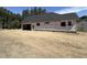 A newly constructed garage featuring homeGUARD weather barrier, and ample space at 5021 Mitchell Town Rd, Youngsville, NC 27596