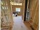 An interior framing view showcasing the construction of a new home with visible wall studs and flooring at 5021 Mitchell Town Rd, Youngsville, NC 27596