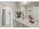 This bathroom features a white marble countertop and modern fixtures at 512 Montague Ln, Raleigh, NC 27601