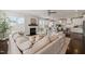 Open-concept living room featuring a fireplace, comfortable seating, and modern decor at 512 Montague Ln, Raleigh, NC 27601