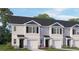 Charming townhome with black shutters and a one car garage at 517 Fife Ct, Gibsonville, NC 27249