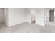 Bright bedroom featuring neutral carpet, ensuite bathroom, and walk-in closet at 525 Lochalsh Dr, Gibsonville, NC 27249