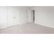 Bedroom featuring plush carpet, closet, and neutral walls at 525 Lochalsh Dr, Gibsonville, NC 27249