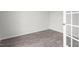 Versatile room with durable wood-look floors and a bright, airy atmosphere from a glass panel door at 525 Lochalsh Dr, Gibsonville, NC 27249