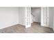 Bright, flexible room with wood-look flooring, perfect as a study or office space at 525 Lochalsh Dr, Gibsonville, NC 27249