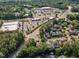 Overhead view showcasing the proximity of a residential area to nearby shopping and commercial centers at 5600 Bennettwood Ct, Raleigh, NC 27612