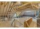 Unfinished attic with exposed wood beams, ready to be transformed into a functional living space at 5600 Bennettwood Ct, Raleigh, NC 27612