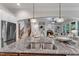 Gourmet kitchen with granite countertops, stainless steel appliances, and a view of the living room at 5600 Bennettwood Ct, Raleigh, NC 27612