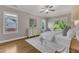 Cozy main bedroom with hardwood floors, lots of windows, and neutral wall paint at 5600 Bennettwood Ct, Raleigh, NC 27612