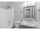 Bathroom offers shower, toilet, vanity with light gray cabinet, and marble-like countertop at 5613 Deerborn Dr, Apex, NC 27539