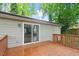 Exterior features a wooden deck with sliding glass doors leading into the home at 5613 Deerborn Dr, Apex, NC 27539