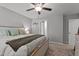 Comfortable bedroom featuring a ceiling fan, neutral walls, and stylish decor at 60 Northdale Ct, Louisburg, NC 27549
