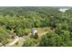 Secluded home surrounded by lush greenery and mature trees, offering a private and tranquil setting at 7116 Incline Dr, Wake Forest, NC 27587