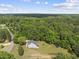 Expansive aerial view highlighting the home's generous lot size and tranquil wooded surroundings at 7116 Incline Dr, Wake Forest, NC 27587