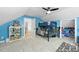 Blue bedroom with a bunk bed, closet space and a bookcase at 7116 Incline Dr, Wake Forest, NC 27587